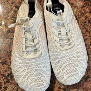 White and Tan Athletic Shoes